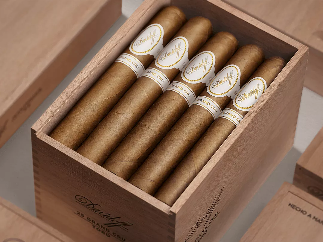 Opened wooden box of Davidoff Grand Cru Toro cigars