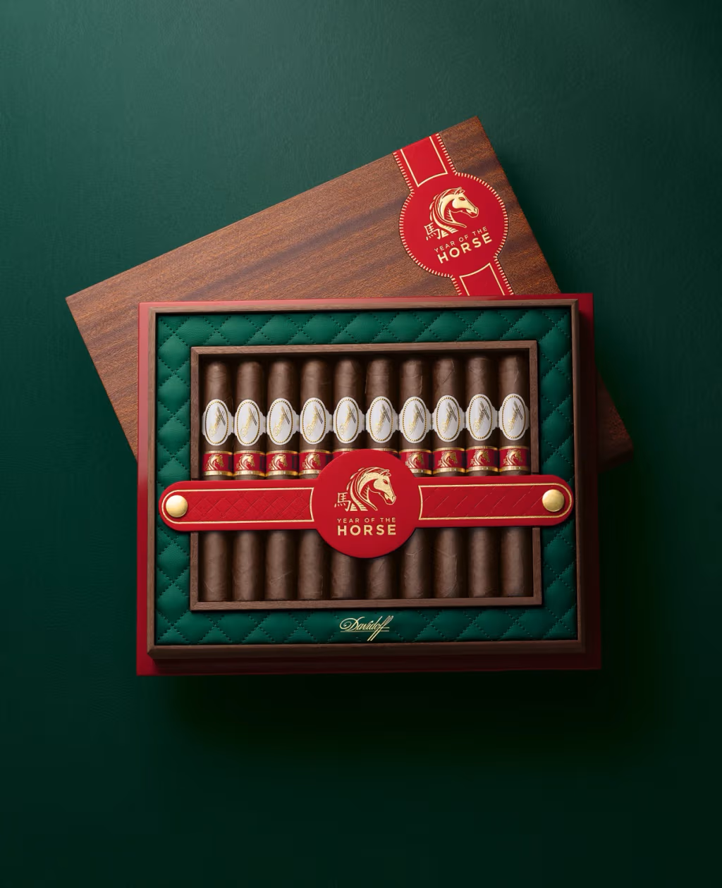 The opened wooden box of the Year of the Horse toro especial cigar.
